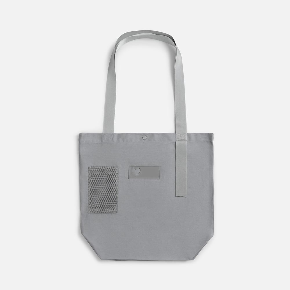 Шопер-конструктор Taga с зелеными элементами фото на сайте Print Logo.