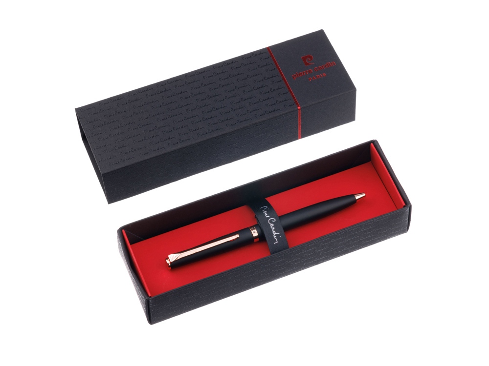 Ручка шариковая Pierre Cardin коллекция ГАММА (GAMME). Корпус - латунь. Материал клипа - нержавеющая сталь. Отделка и детали дизайна - матовое покрытие, детали цвета розового золота. Цвет - черный. Упаковка Е